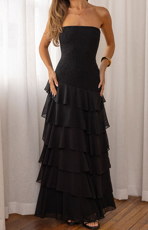 Beginning Boutique Riles Black Strapless Ruffle Maxi Dress black strapless maxi dress with a smocked bodice and tiered ruffle skirt