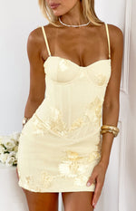 Yellow corset mini dress with boning, delicate 3D flower appliques, and a subtle textured fabric