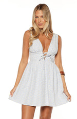Front view of a light blue gingham mini dress with yellow floral details, deep V-neck, and tie-front bust