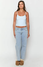 Light blue and white striped ribbed singlet with a scalloped trim scoop neckline and thin spaghetti straps