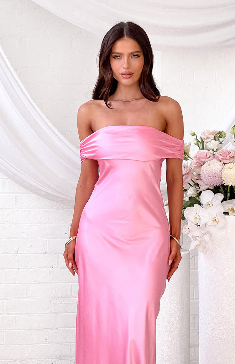 Pink satin off-shoulder maxi dress with a wide gathered neckline and elegant drape