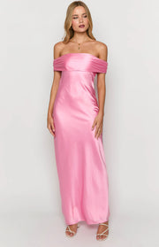 Front view of a pink satin off-the-shoulder maxi dress with ruched detailing