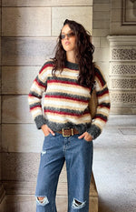 Fuzzy multi-stripe oversized sweater with white, beige, dark red, and grey stripes and a round neck