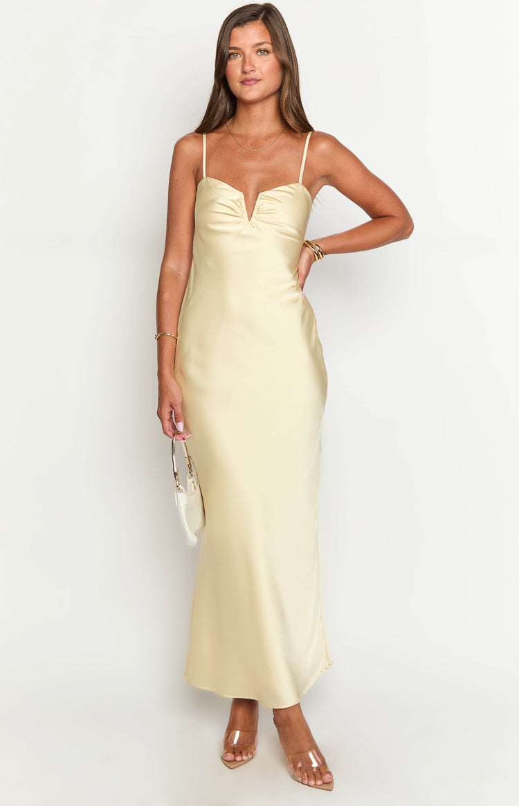 Yellow satin maxi dress with a ruched V-neckline and delicate spaghetti straps