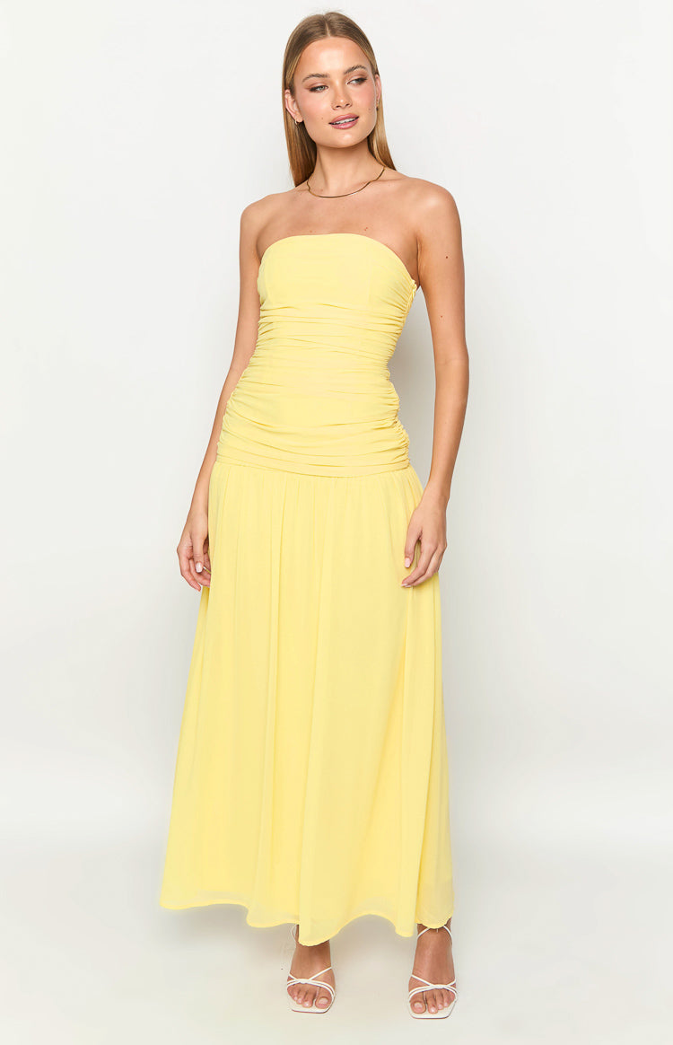 Yellow strapless maxi dress with a fitted ruched bodice and a flowy A-line skirt
