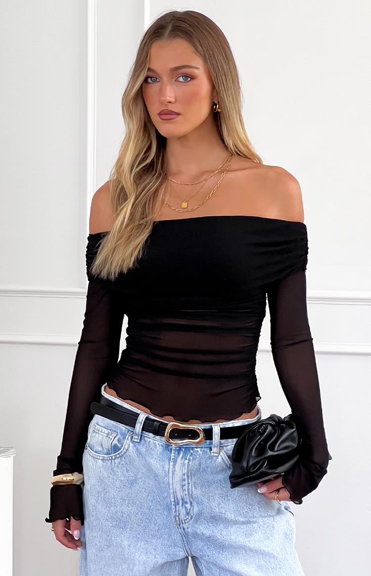 Beginning Boutique Sky Black Mesh Off Shoulder Top black sheer mesh off-shoulder top with long sleeves and ruched body