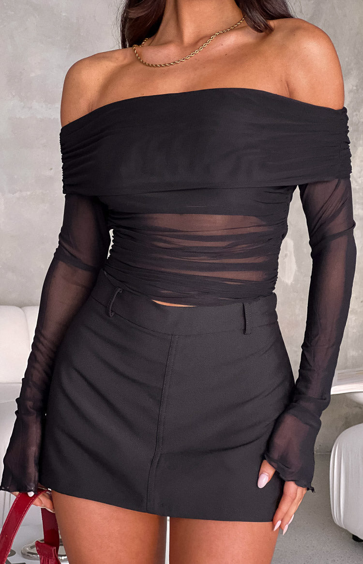 Black off the shoulder long sleeve mesh top.