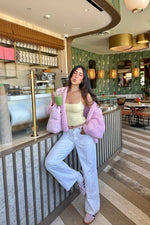 Sorbet pink chunky knit cardigan with wide long sleeves and a relaxed open front