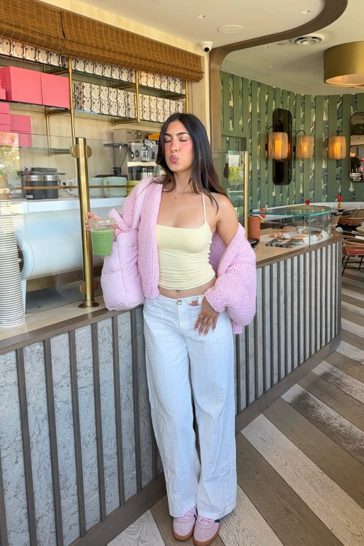 Sorbet pink chunky knit cardigan worn open, showing the relaxed fit and voluminous sleeves