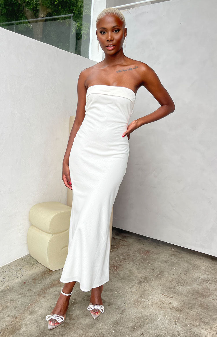 Cream textured strapless midi dress with a straight bandeau neckline and fitted bodice