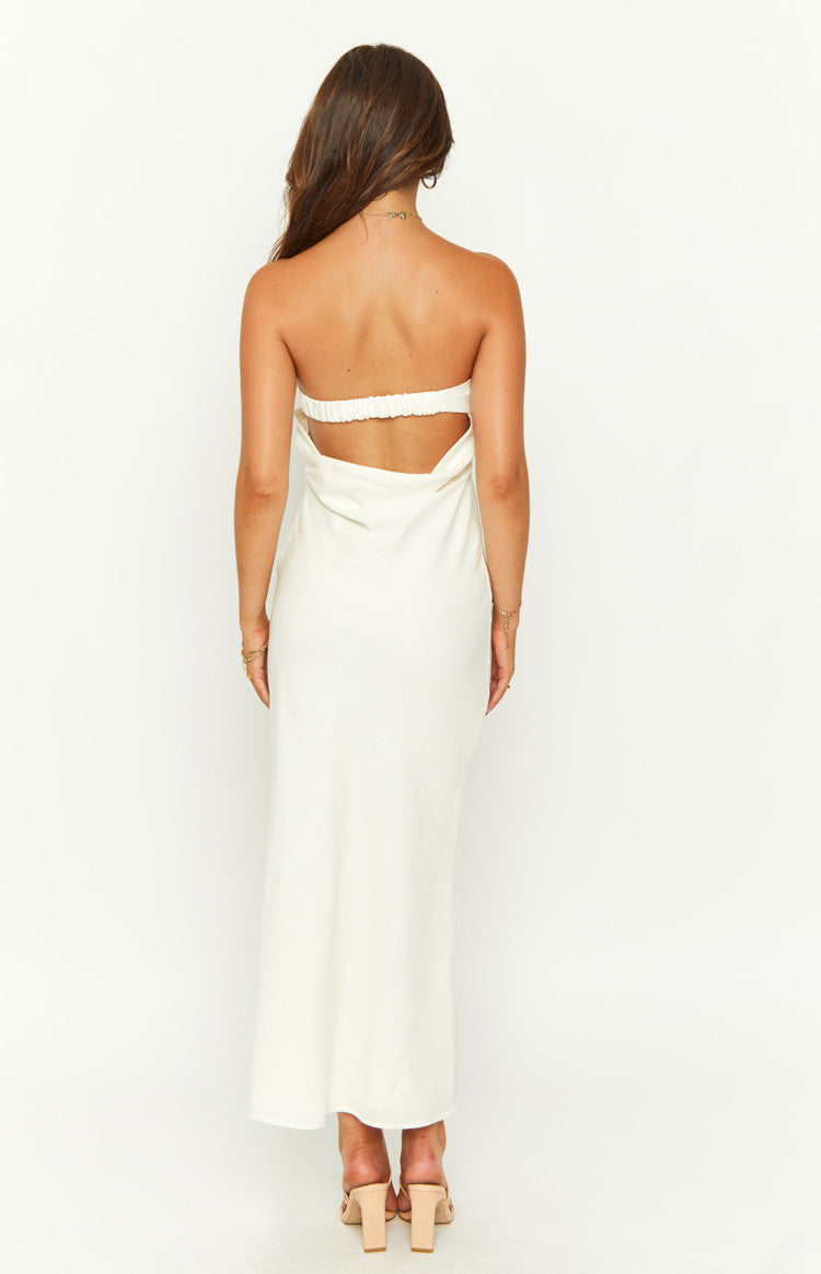 Rear view of a cream strapless midi dress with an elasticated back band and large lower back cutout