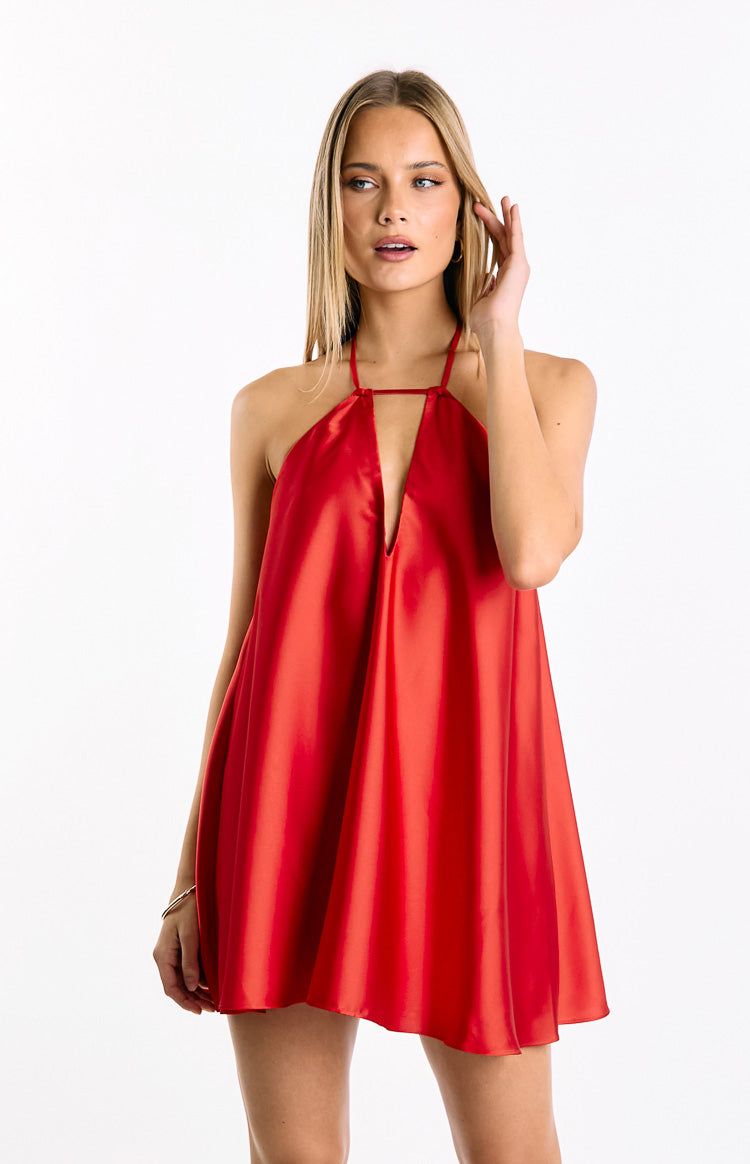 Red halter neck mini dress with a deep V-neck, horizontal chest strap, and a flowy A-line silhouette