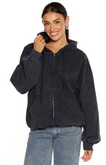 Front view of a washed navy oversized hooded jacket with full zip front, drawstrings, and kangaroo pockets