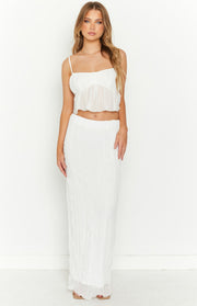 White crinkled maxi skirt with a fitted waist and straight cut, extending to the floor