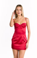 A sophisticated red satin mini-dress with thin spaghetti straps in a sweetheart neckline and a scalloped lace trim on the bust. The dress has visible seams on the bodice.