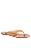 Beginning Boutique Twila Tan Jelly Thongs tan translucent jelly flip-flops with thin straps and flat sole