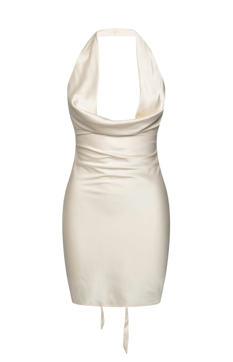 Side view of a champagne satin mini dress with a draped cowl neck, open sides, and tie-back waist