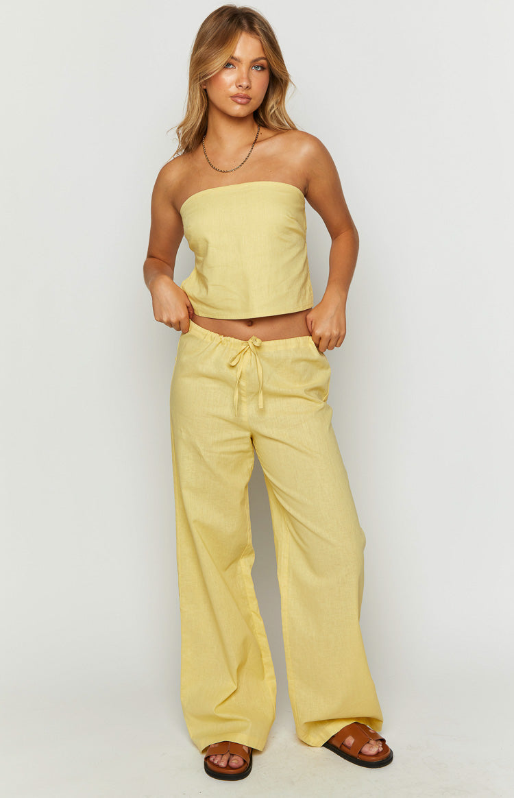 Full length view of yellow wide-leg pants with a drawstring waist