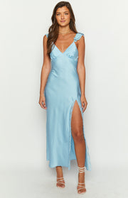 Front view of a light blue satin V-neck maxi dress with ruffled straps and a high lace-trimmed leg split