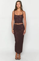 Beginning Boutique Willow Brown Lace Midi Skirt brown floral lace midi skirt with a fitted silhouette and sheer hem