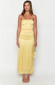 Front view of a yellow satin strapless maxi dress with a fitted ruched bodice and a straight skirt