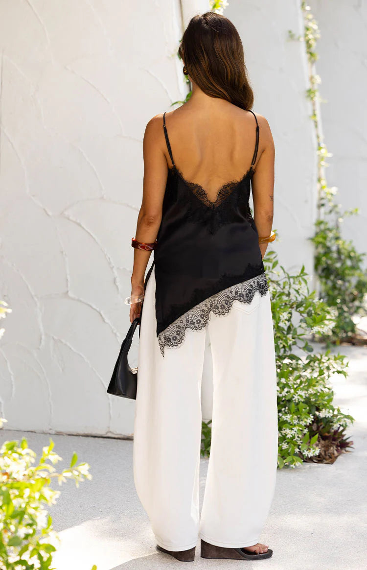 Ziva Black Satin Lace Trim Asymmetrical Top | Beginning Boutique US