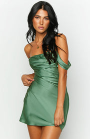 Green satin off-the-shoulder mini dress with draped bodice and fitted silhouette