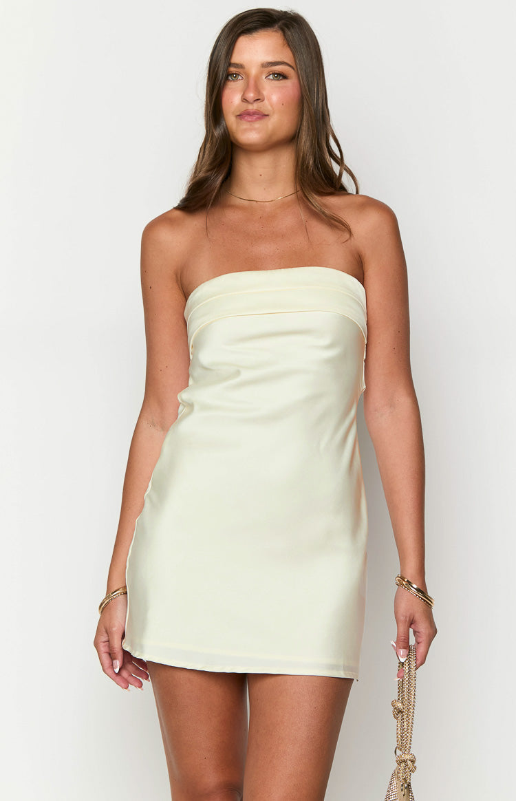 Front view of a cream strapless mini dress with a folded detail across the bust