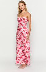 Side view of the pink floral strapless maxi dress with a ruched bow detail at the bust