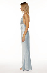 Side view of a light blue satin maxi dress with deep side cutouts, sheer mesh panel, and long tie detail