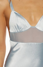 Close-up of the light blue satin maxi dress bodice with a sheer mesh midriff panel