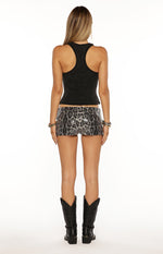 Rear view of the fitted silver leopard sequin micro shorts, showing the all-over sequin detail