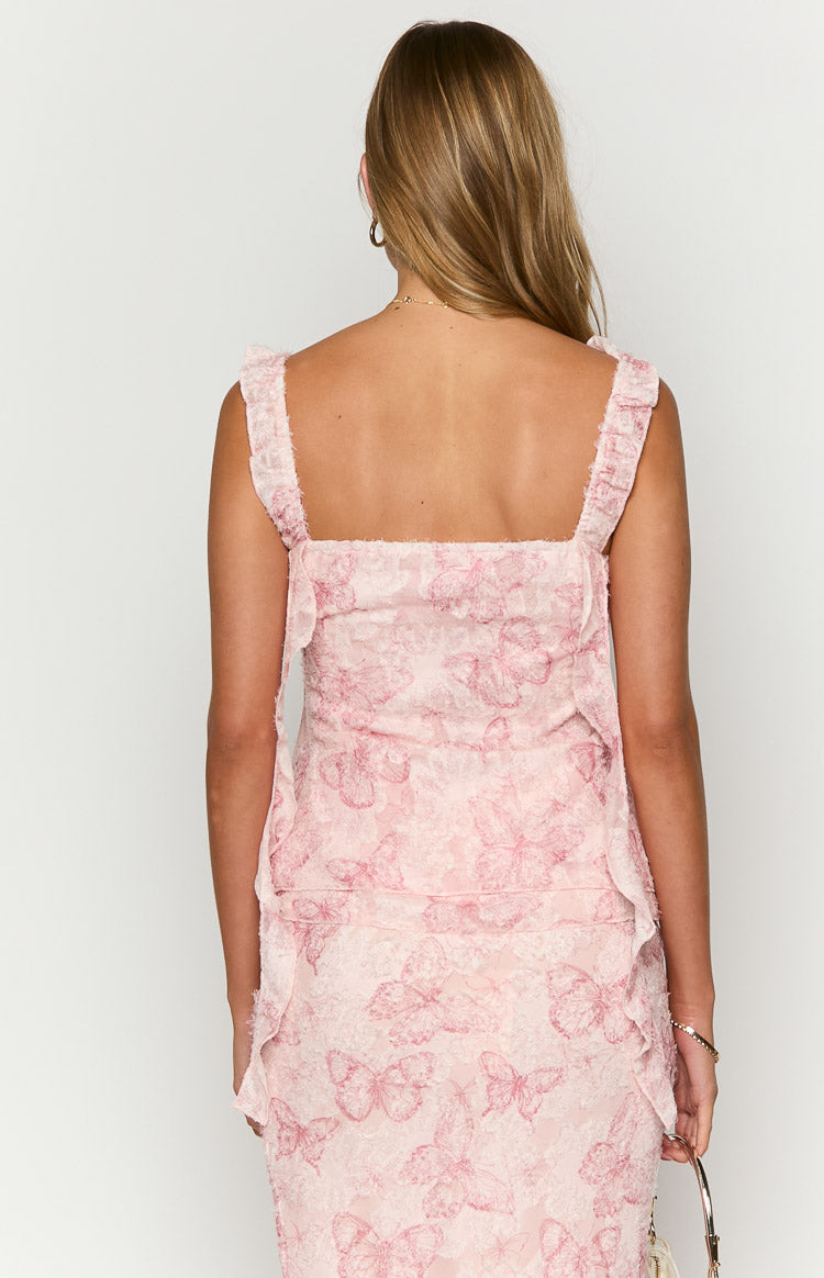Rear view of the light pink butterfly print chiffon top with a square back neckline and ruffled shoulder straps