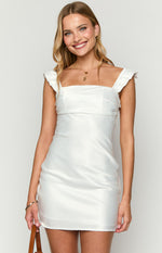 White satin mini dress with a square neckline and ruffled shoulder straps
