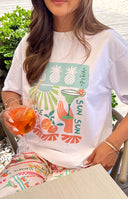 Beginning Boutique Jaz Dolce Vita Print Tee white oversized crew neck tee with a colourful fruit and cocktail graphic print