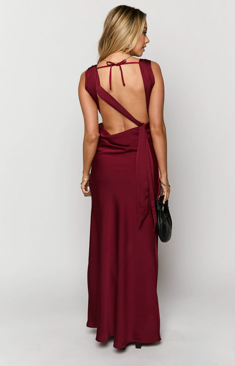 Back view of the wine satin maxi dress with an open back, featuring a delicate neck tie and a wide wrap-around waist tie