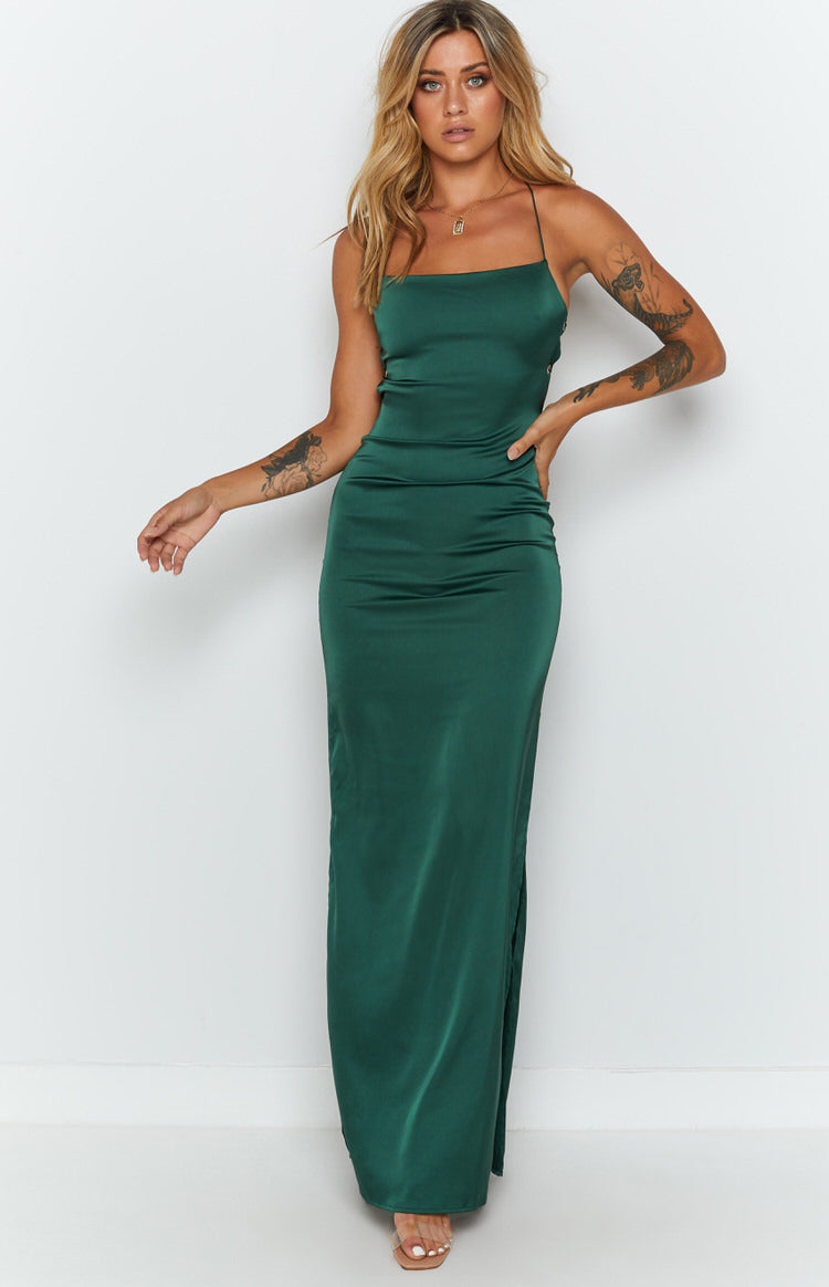 Emerald green satin maxi dress with square neckline, thin straps, and side lace-up detail
